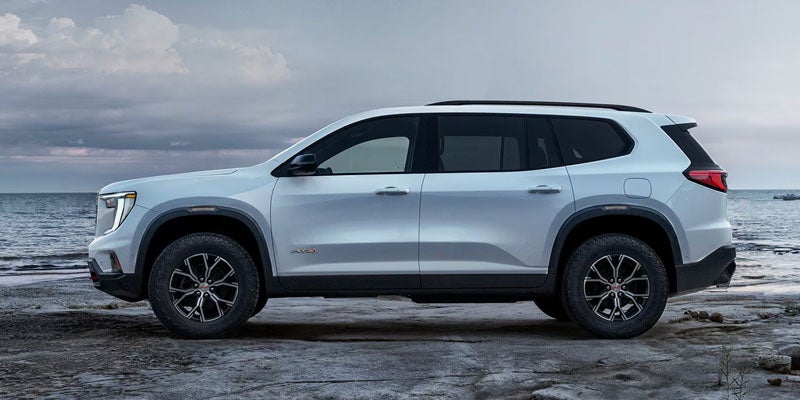 2026 GMC Acadia on road driving view